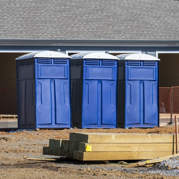 what is the cost difference between standard and deluxe porta potty rentals in Harold